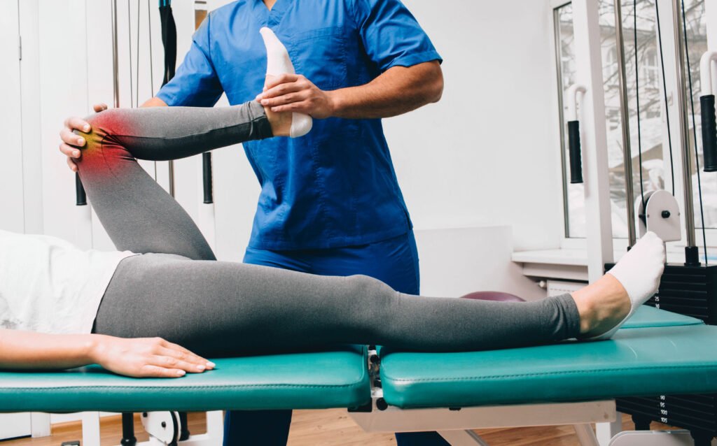 Clinician assisting with a knee exercise in a BPC 157 Canada research guide